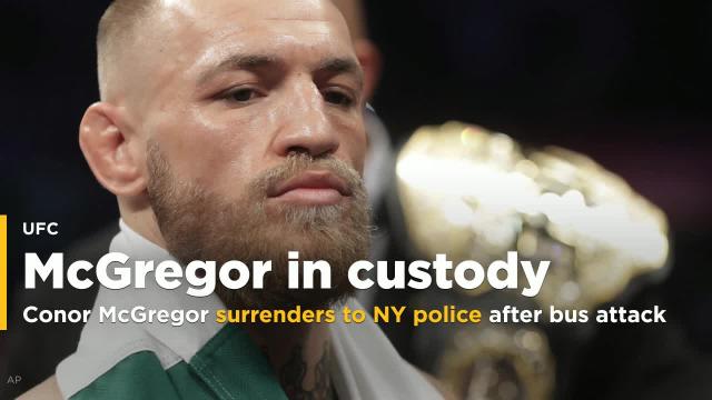 Conor McGregor surrenders to New York police after bus attack