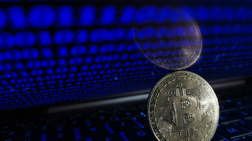 Representation of Bitcoin is seen with binary code displayed on a laptop screen in this illustration photo taken in Krakow, Poland on August 17, 2021. (Photo by Jakub Porzycki/NurPhoto via Getty Images)