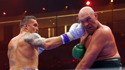 Getty Images - Ukraine's Oleksandr Usyk (L) fights against Britain's Tyson Fury during a heavyweight boxing world championship fight at Kingdom Arena in Riyadh, Saudi Arabia on May 19, 2024. Oleksandr Usyk beat Tyson Fury by split decision to win the world's first undisputed heavyweight championship in 25 years on May 19, 2024, an unprecedented feat in boxing's four-belt era. (Photo by Fayez NURELDINE / AFP) (Photo by FAYEZ NURELDINE/AFP via Getty Images)