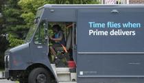 FILE - An Amazon truck makes deliveries in Wheeling, Ill., May 16, 2024. (AP Photo/Nam Y. Huh, File)