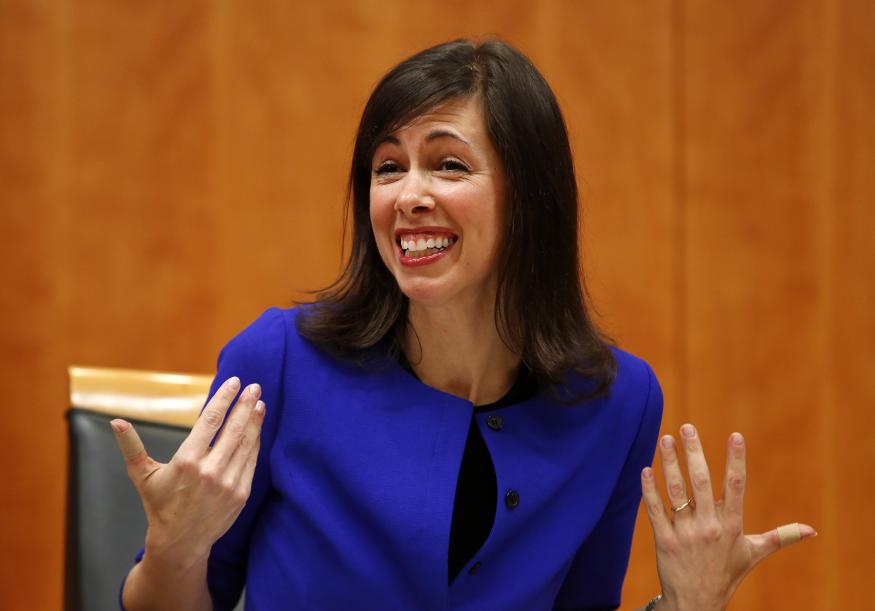 Federal Communications Commission (FCC) commissioner Jessica Rosenworcel attends a FCC Net Neutrality hearing in Washington February 26, 2015. The FCC is expected Thursday to approve Chairman Tom Wheeler's proposed "net neutrality" rules, regulating broadband providers more heavily than in the past and restricting their power to control download speeds on the web. REUTERS/Yuri Gripas (UNITED STATES - Tags: POLITICS SCIENCE TECHNOLOGY BUSINESS TELECOMS)