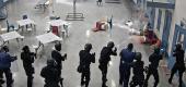 A screenshot of video surveillance footage obtained by the Office of Inspector General shows La Palma Correctional Center staff firing pepper spray and chemical agents at detainees in Arizona. (The New York Times)