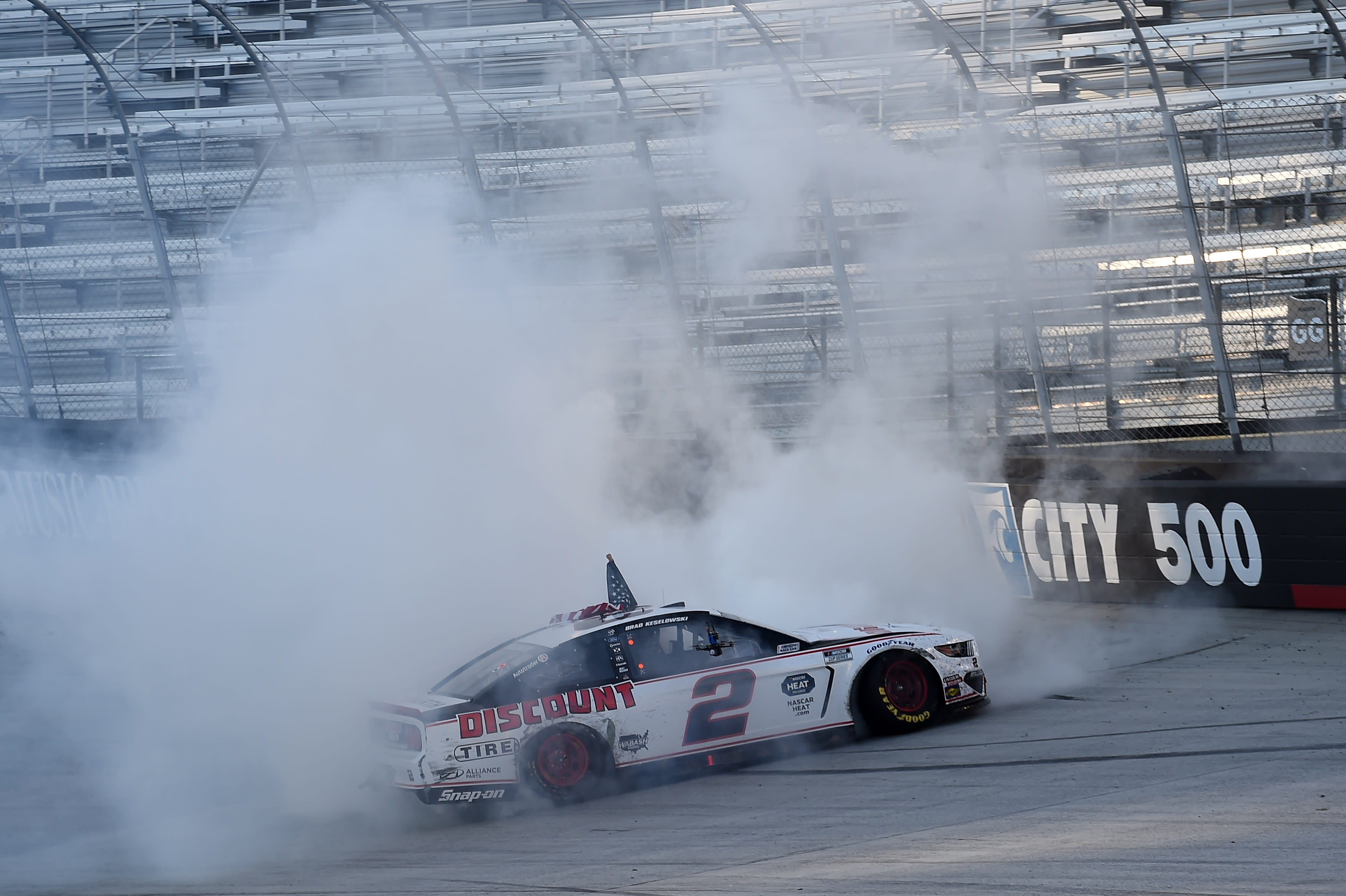 Brad Keselowski wins at Bristol after Chase Elliott and Joey Logano wreck while racing for the lead - Yahoo Sports