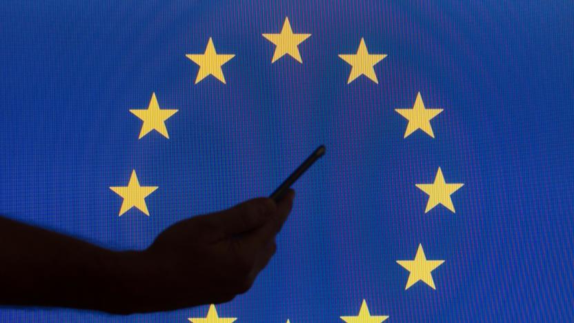 The EU flag is seen with logos of American technology companies. (Photo by Jaap Arriens/NurPhoto via Getty Images)