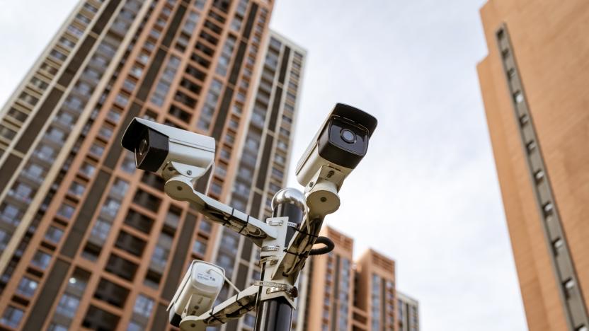 Security camera against residential buildings background
