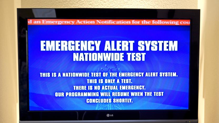 A television screen displays messages during the first test of the Nationwide Emergency Alert System (EAS). This was the first test of the system designed to broadcast a nationwide message to the American public. (Photo by Kim Kulish/Corbis via Getty Images)