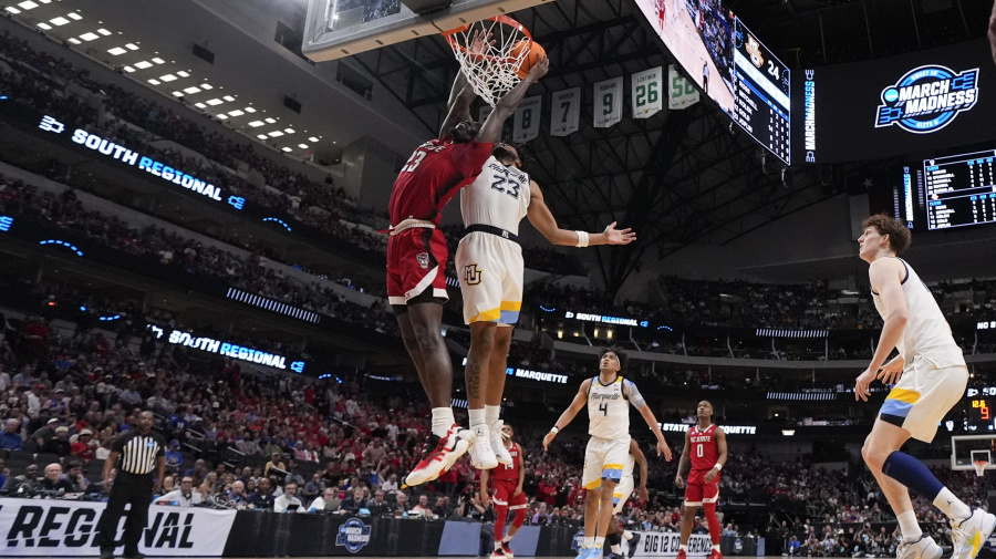 Associated Press - Marquette's David Joplin, top right, blocks a shot by North Carolina State's Mohamed Diarra during the first half of a Sweet 16 college basketball game in the NCAA Tournament in Dallas, Friday, March 29, 2024. (AP Photo/Tony Gutierrez)