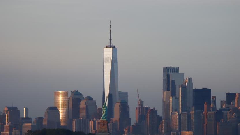 JERSEY CITY, NJ - JUNE 27: The sun sets on the skyline of lower Manhattan, One World Trade Center and the Statue of Liberty in New York City on June 27, 2021 as seen from Jersey City, New Jersey. (Photo by Gary Hershorn/Getty Images)