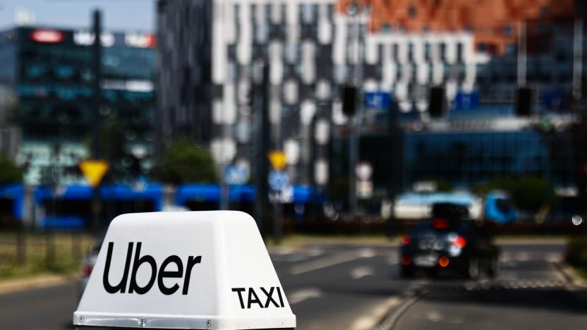 Uber sign is seen on a car in Krakow, Poland on July 4, 2023. (Photo by Jakub Porzycki/NurPhoto via Getty Images)