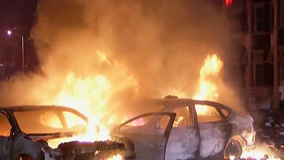 Raw: Rioters Burn Cars in Baltimore