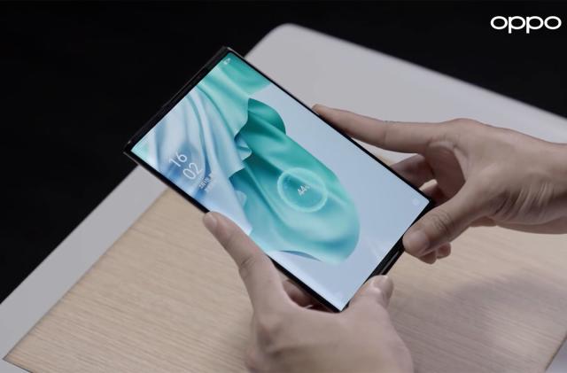 Oppo demonstrates its over-the-air wireless charging tech using its X 2021 rollable phone.