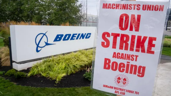 Boeing boosts offer to striking machinists