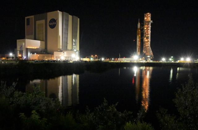 NASA’s next-generation moon rocket, the Space Launch System (SLS) rocket with its Orion crew capsule perched on top, passes the Turn Basin as it leaves the Vehicle Assembly Building (VAB) on a slow-motion journey to its launch pad at Cape Canaveral, Florida, U.S. August 16, 2022. REUTERS/Steve Nesius