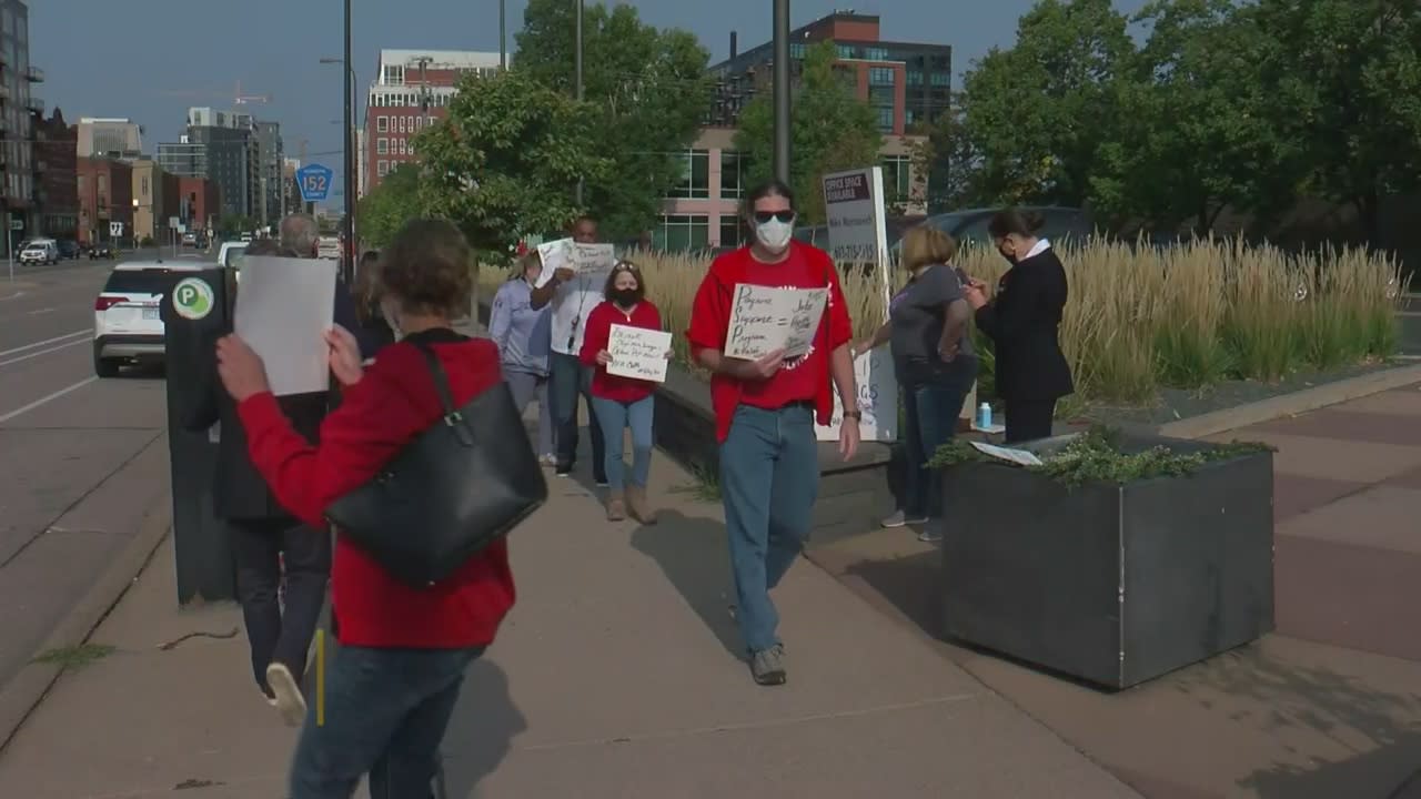 Minnesota Flight Attendants Rally Outside Klobuchar's Office