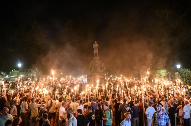 White nationalists participate in a torch-lit march on the grounds of the University of Virginia ahead of the Unite the Right Rally in Charlottesville, Virginia on August 11, 2017. Picture taken August 11, 2017.   REUTERS/Stephanie Keith