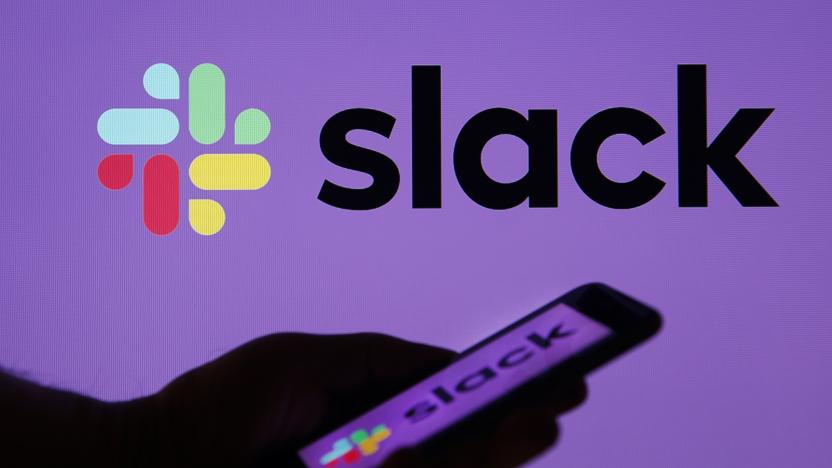 PARIS, FRANCE - FEBRUARY 06: In this photo illustration, the Slack logo is displayed on the screen of an Apple iPhone in front of a computer screen displaying a Slack logo on February 06, 2019 in Paris, France. Slack announced in a statement that it had "confidentially" filed its file with the SEC for an IPO. Launched in 2014 in San Francisco, the US Enterprise Messaging boasts 10 million daily active users in more than 150 countries worldwide. (Photo by Chesnot/Getty Images)