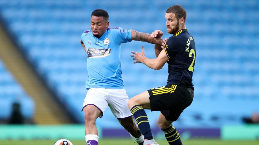 MANCHESTER, ENGLAND - JUNE 17: Gabriel Jesus of Manchester City takes on Shkodran Mustafi of Arsenal during the Premier League match between Manchester City and Arsenal FC at Etihad Stadium on June 17, 2020 in Manchester, United Kingdom. (Photo by Matt McNulty - Manchester City/Manchester City FC via Getty Images)