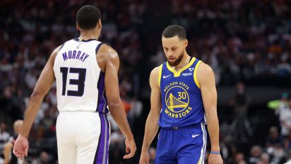 Getty Images - SACRAMENTO, CALIFORNIA - APRIL 16: Stephen Curry #30 of the Golden State Warriors walks back downcourt with his head down next to Keegan Murray #13 of the Sacramento Kings in the first quarter during the Play-In Tournament at Golden 1 Center on April 16, 2024 in Sacramento, California.  NOTE TO USER: User expressly acknowledges and agrees that, by downloading and or using this photograph, User is consenting to the terms and conditions of the Getty Images License Agreement.  (Photo by Ezra Shaw/Getty Images)