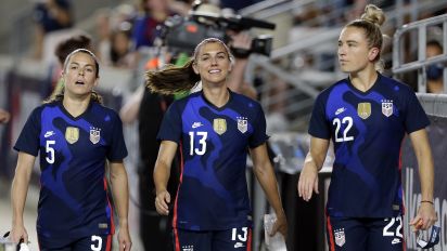 Associated Press - USA defender Kelley O'Hara (5), forward Alex Morgan (13) and midfielder Kristie Mewis (22) enter the field before their match against Jamaica in the 2021 WNT Summer Series match Sunday, June 13, 2021, in Houston. (AP Photo/Michael Wyke)