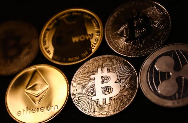 Representation of cryptocurrencies are seen in this illustration photo taken in Krakow, Poland on August 10, 2022. (Photo by Jakub Porzycki/NurPhoto via Getty Images)