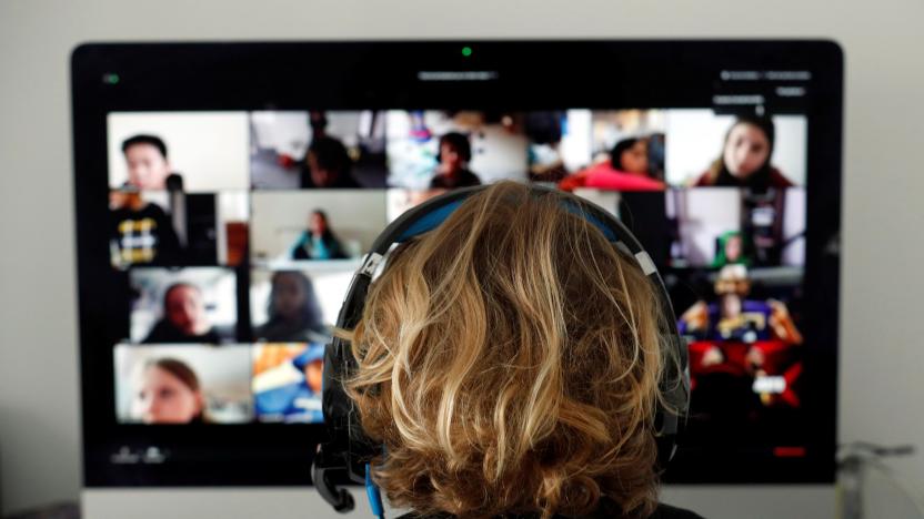 A student takes classes online with his companions using the Zoom APP at home during the coronavirus disease (COVID-19) outbreak in El Masnou, north of Barcelona, Spain April 2, 2020. REUTERS/ Albert Gea