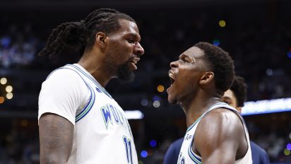 Getty Images - DENVER, COLORADO - MAY 19: Anthony Edwards #5 of the Minnesota Timberwolves reacts to a three-pointer with Naz Reid #11 of the Minnesota Timberwolves against the Denver Nuggets during Game Seven of the Western Conference Second Round Playoffs at Ball Arena on May 19, 2024 in Denver, Colorado. NOTE TO USER: User expressly acknowledges and agrees that, by downloading and or using this photograph, User is consenting to the terms and conditions of the Getty Images License Agreement. (Photo by C. Morgan Engel/Getty Images)