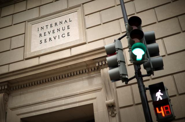 WASHINGTON, DC - APRIL 27: The Internal Revenue Service headquarters building appeared to be mostly empty April 27, 2020 in the Federal Triangle section of Washington, DC. The IRS called about 10,000 volunteer employees back to work Monday at 10 of its mission critical locations to work on taxpayer correspondence, handling tax documents, taking telephone calls and other actions related to the tax filing season. (Photo by Chip Somodevilla/Getty Images)