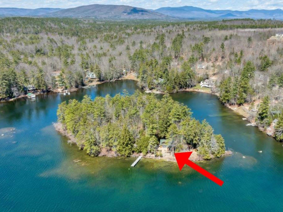 A private island with a 3-bedroom home in New Hampshire's biggest lake is listed..