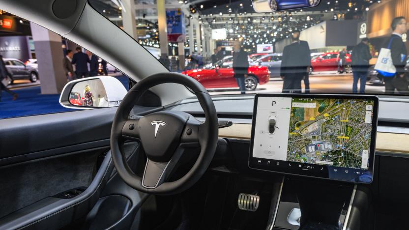 BRUSSELS, BELGIUM - JANUARY 09: Tesla Model 3 compact full electric car interior with a large touch screen on the dashboard on display at Brussels Expo on January 9, 2020 in Brussels, Belgium. The Model 3 is fitted with a full self-driving system. (Photo by Sjoerd van der Wal/Getty Images)