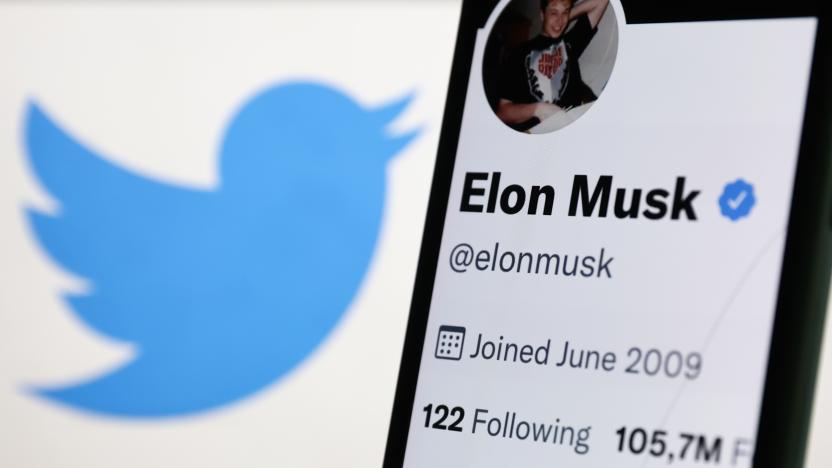 Elon Musk's Twitter profile displayed on a phone screen and Twitter logo displayed on a screen are seen in this illustration photo taken in Krakow, Poland on September 15, 2022. (Photo by Jakub Porzycki/NurPhoto via Getty Images)