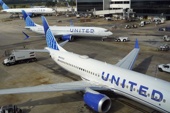 A United Airlines plane is pushed from the gate at George Bush Intercontinental Airport Friday, Aug. 11, 2023, in Houston. (AP Photo/David J. Phillip)