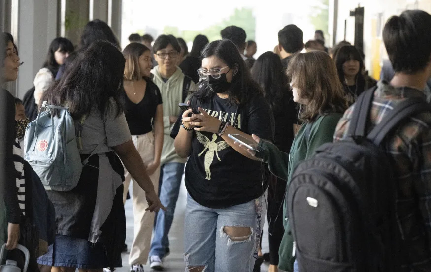 ANAHEIM, CA - August 10: Students mingle before heading to the first day of class following summer recess at Anaheim High School in Anaheim, CA on Wednesday, August 10, 2022. Public high schools will start no earlier than 8:30 a.m. after a new state law went into effect July 1st. (Photo by Paul Bersebach/MediaNews Group/Orange County Register via Getty Images)