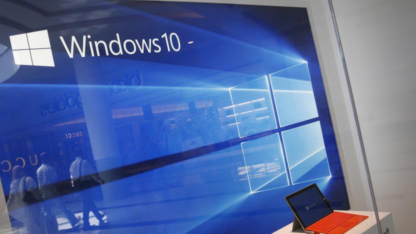 A display for the Windows 10 operating system is seen in a store window at the Microsoft store at Roosevelt Field in Garden City, New York July 29, 2015. Microsoft Corp's launch of its first new operating system in almost three years, designed to work across laptops, desktop and smartphones, won mostly positive reviews for its user-friendly and feature-packed interface.REUTERS/Shannon Stapleton