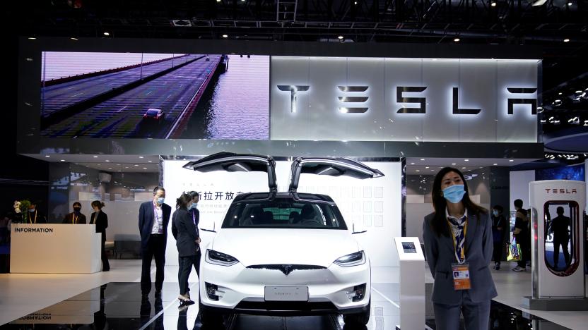 Tesla sign is seen at the third China International Import Expo (CIIE) in Shanghai, China November 5, 2020. REUTERS/Aly Song