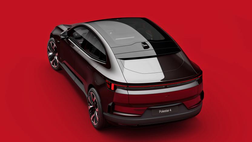 The Polestar 4 electric SUV in black seen from above and behind against a red floor.