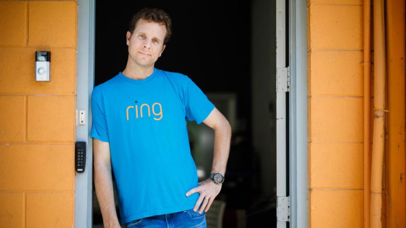 A photo of Ring founder Jamie Siminoff leaning against a door frame.