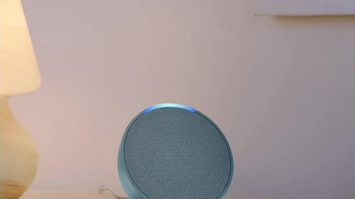 A smart speaker on a table.