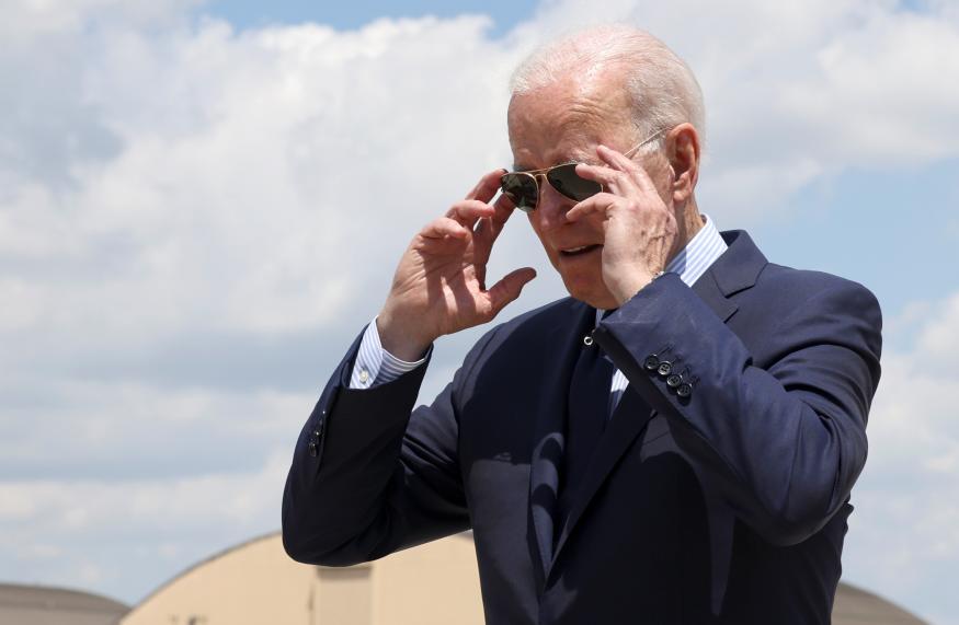 U.S. President Joe Biden takes off his sunglasses to speak to media ahead of his departure from Washington for travel to Cleveland, Ohio at Joint Base Andrews, Maryland, U.S., May 27, 2021. REUTERS/Evelyn Hockstein