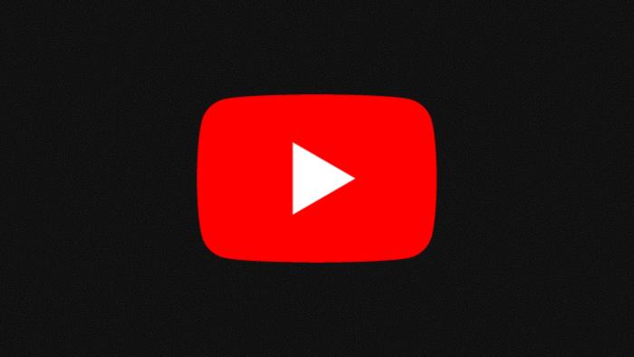 The red YouTube logo on a grainy black background