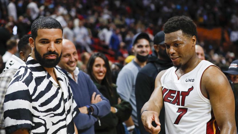 Jan 14, 2022; Miami, Florida, USA; Miami Heat guard Kyle Lowry (7) and Canadian rapper Drake talk after the game against the Atlanta Hawks at FTX Arena. Mandatory Credit: Sam Navarro-USA TODAY Sports