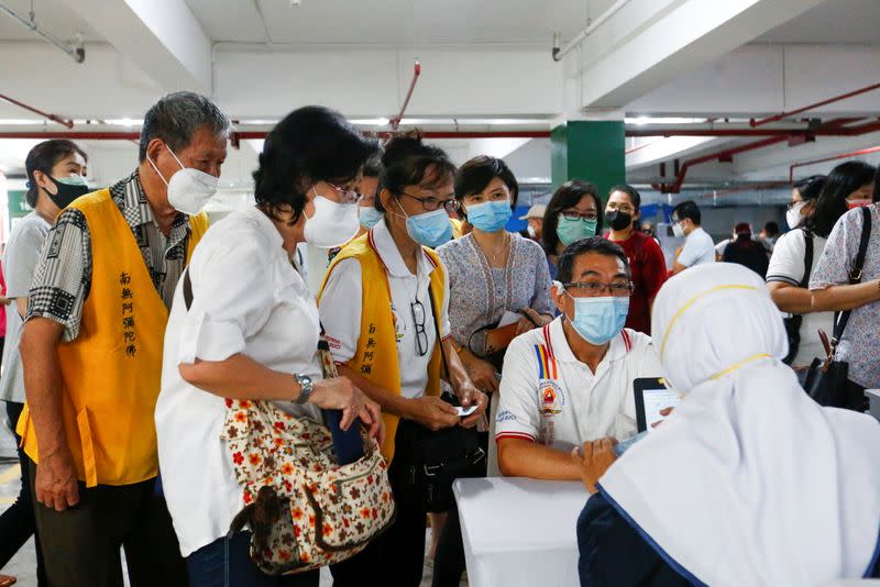 Big turnout as Indonesia  holds mass vaccination drive for 
