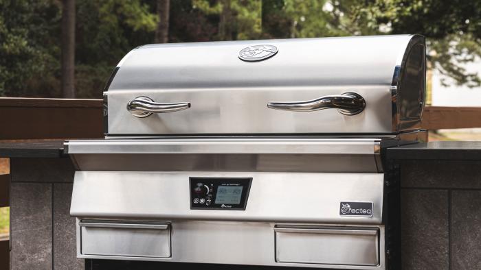 Recteq E-Series Built-In 1300 smart pellet grill designed for outdoor kitchens. The all-stainless-steel grill is closed and mounted on an outdoor counter.