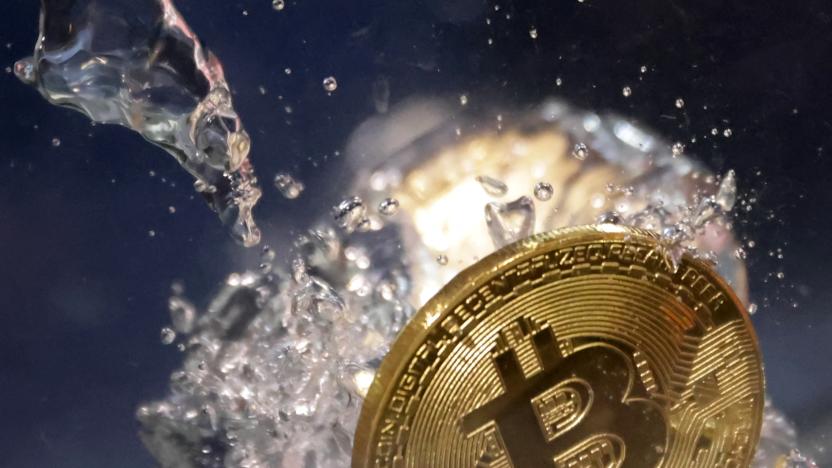A view of a representation of cryptocurrency Bitcoin plunging into water in this illustration taken, May 23, 2022. REUTERS/Dado Ruvic/Illustration