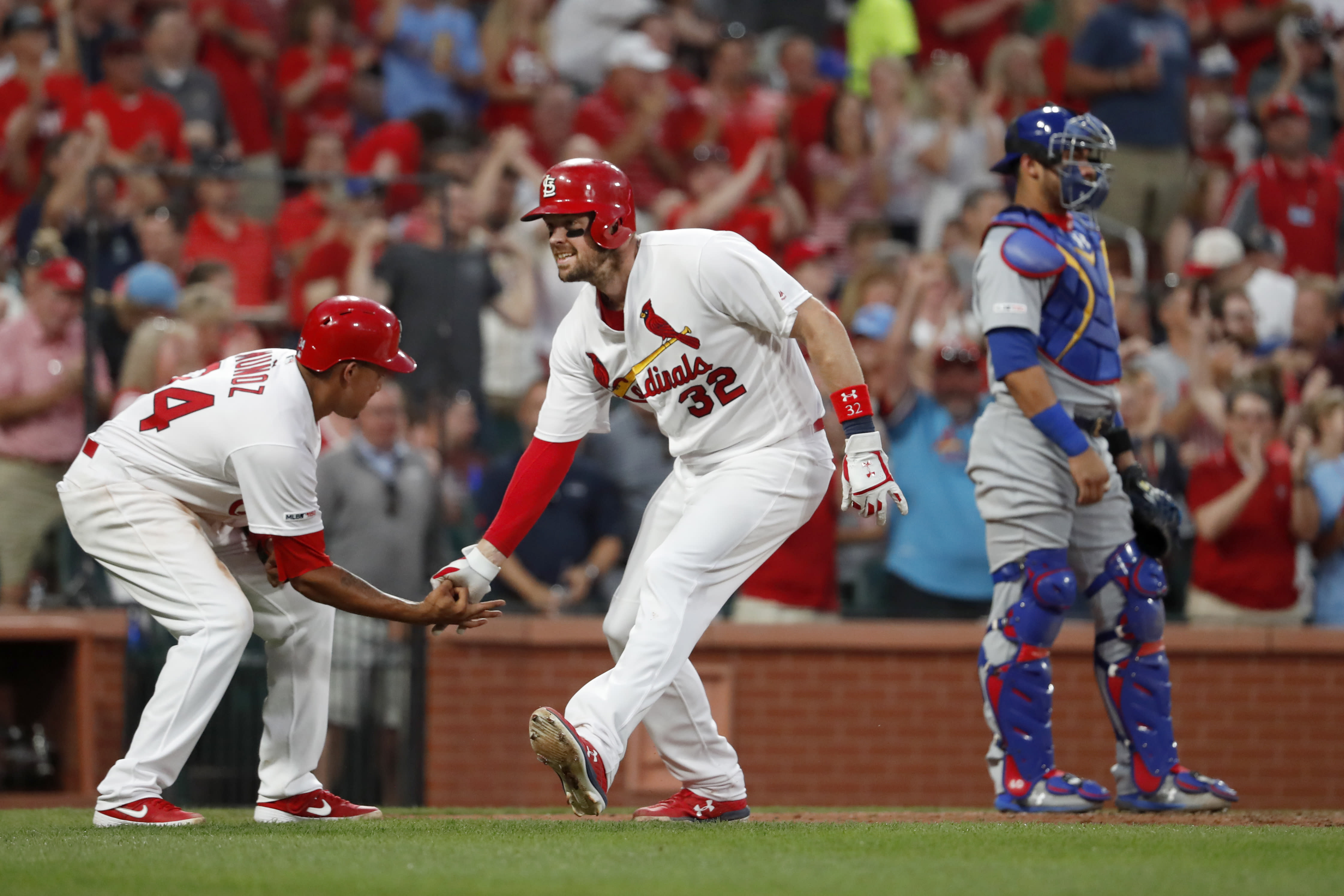 Cardinals beat Cubs 8-0, move into 1st place in NL Central