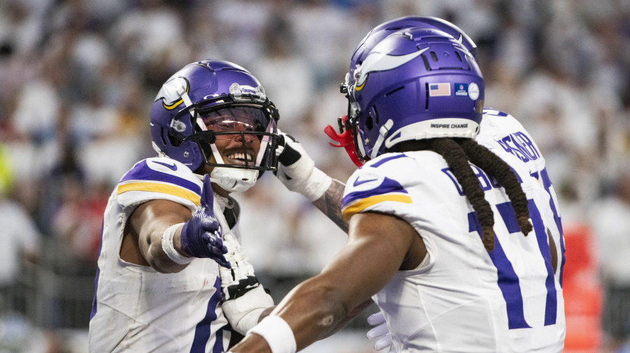 Getty Images - MINNEAPOLIS, MINNESOTA - DECEMBER 24: Justin Jefferson #18 of the Minnesota Vikings celebrates with K.J. Osborn #17 after scoring a touchdown in the second quarter of the game against the Detroit Lions at U.S. Bank Stadium on December 24, 2023 in Minneapolis, Minnesota. (Photo by Stephen Maturen/Getty Images)