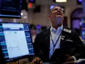 Nasdaq, stocks close flat on eve of Fed's rate decision