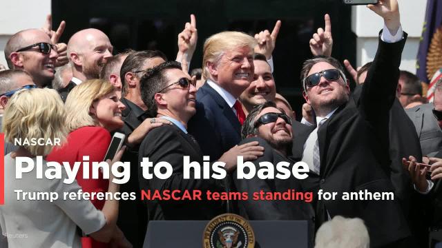 President Donald Trump makes sure to mention NASCAR teams standing for national anthem at ceremony for Martin Truex Jr.