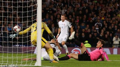 Skrtel own goal seals last-minute Scotland win