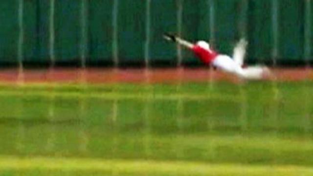 Raw: NC State Player Makes Somersault Catch