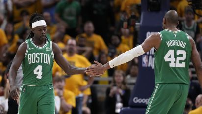 Associated Press - Boston Celtics guard Jrue Holiday (4) celebrates with teammate center Al Horford (42) after making a basket during the second half of Game 4 of the NBA Eastern Conference basketball finals against the Indiana Pacers, Monday, May 27, 2024, in Indianapolis. (AP Photo/Michael Conroy)